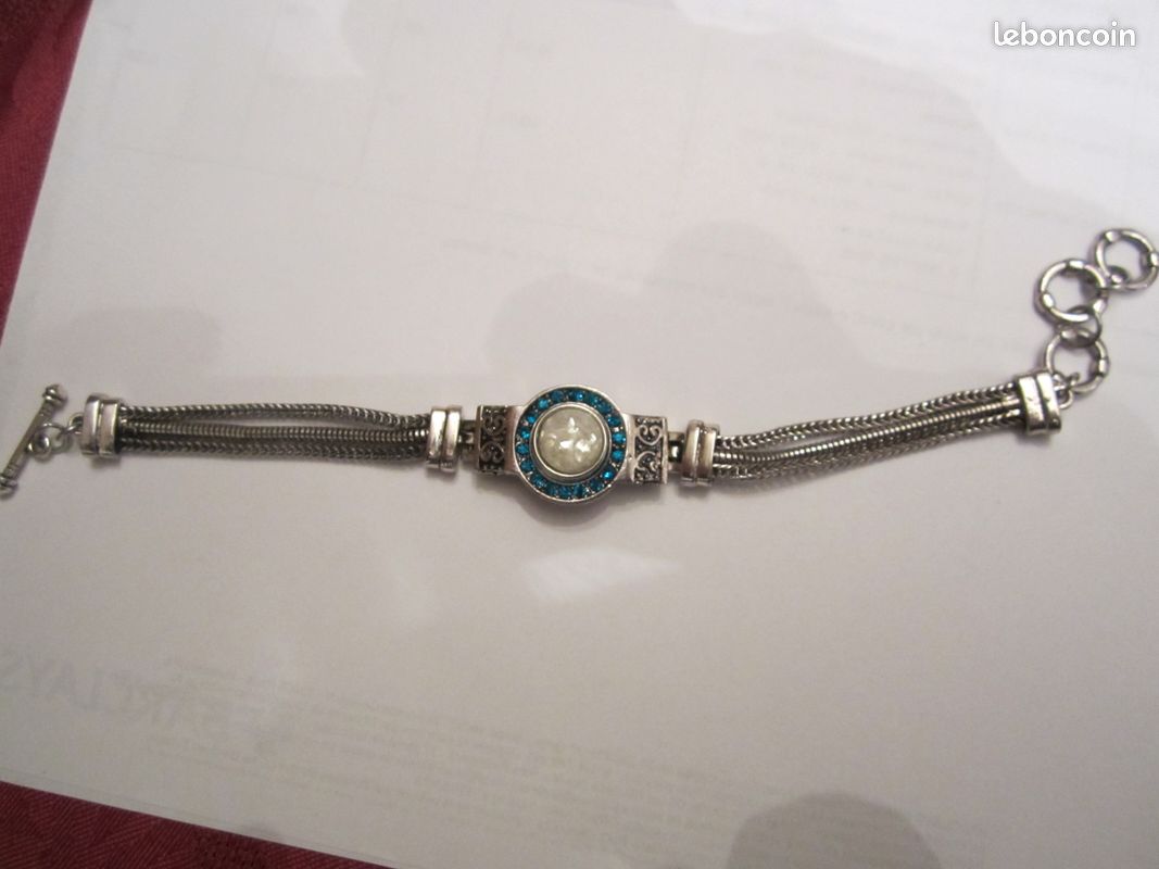 Joli bracelet en acier et métal argenté (image 1)