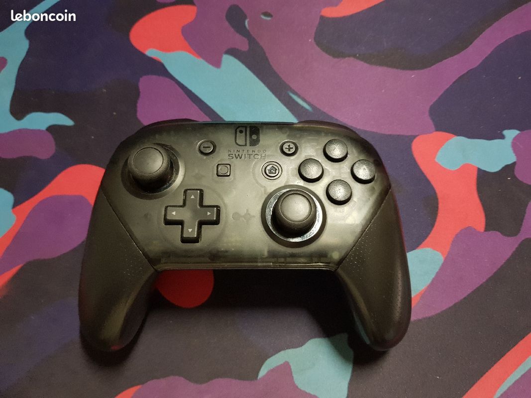 Switch oled + 6 jeux + manette pro. Pris negociable (image 2)