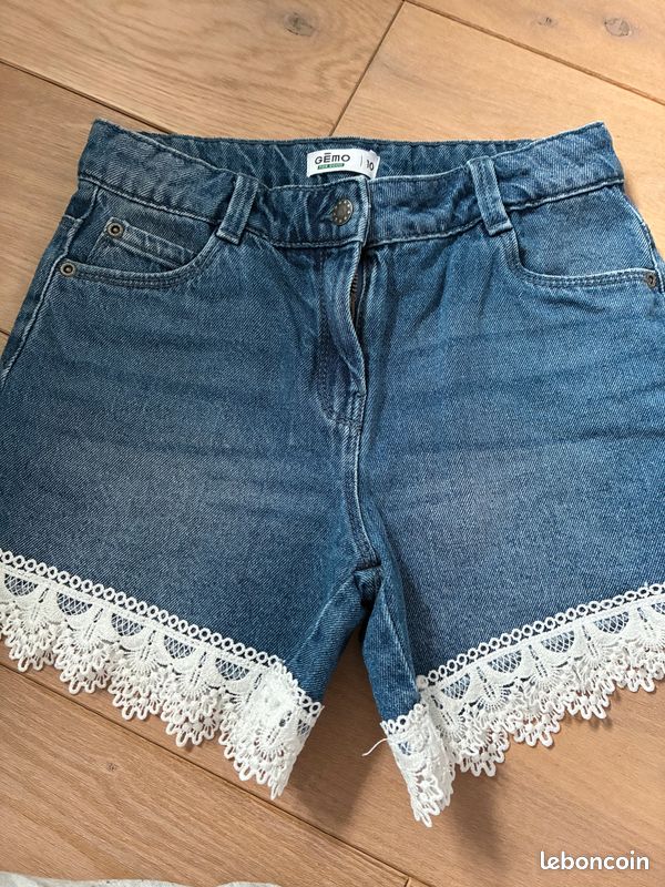 Short en jean délavé à franges fille rose