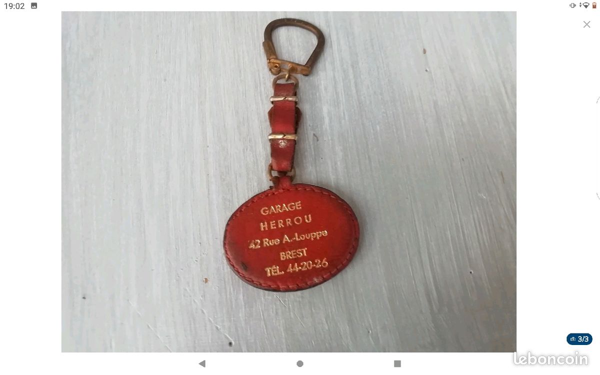 ANCIEN PORTE CLE En Cuir Automobile Peugeot Garage Le Havre EUR 10,90