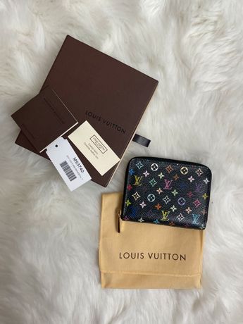 Portefeuille organisateur Louis Vuitton taïga zippé sac long  veltical/embrayage/