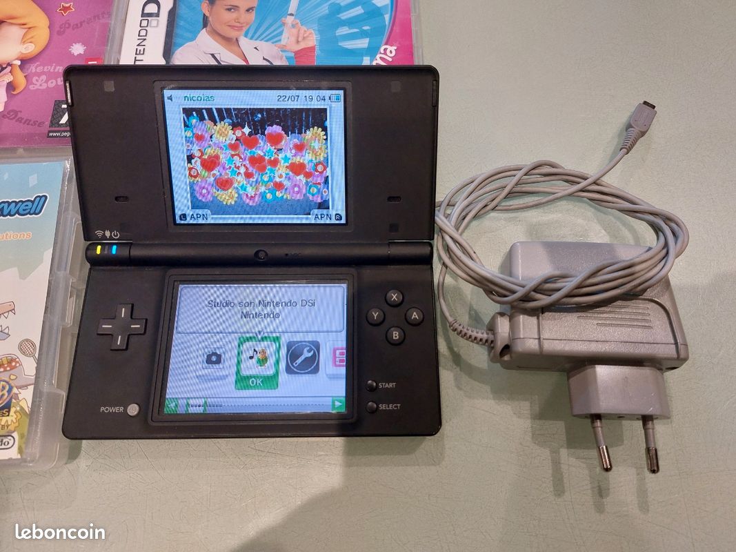 Nintendo DSI 2008, avec 14 jeux, 200 (image 1)