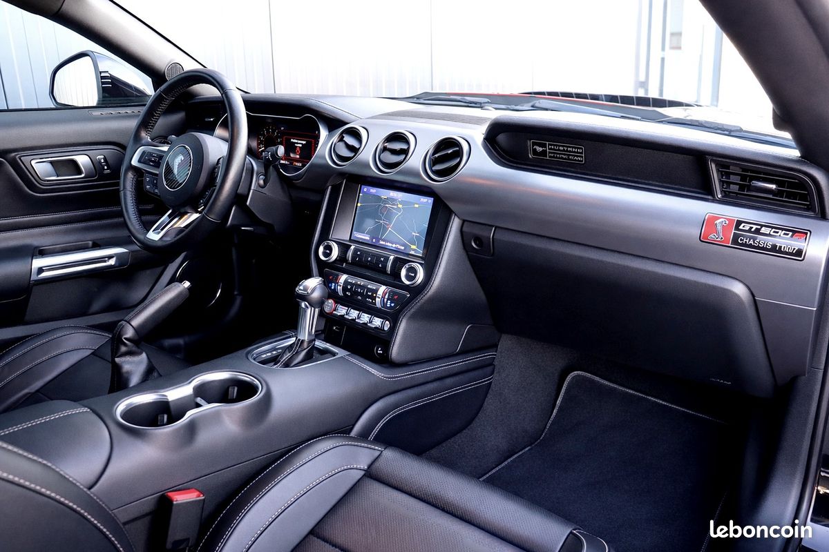 MUSTANG V8 FASTBACK GT 5.0L BVA10 450cv look SHELBY GT500 - malus ecolo + coc inclus - 1er main - Pack premium & confort - HIFI premium B&O + caisson basse - JA 20' - ressorts courts Kw - GTIE 1 an (image 12)