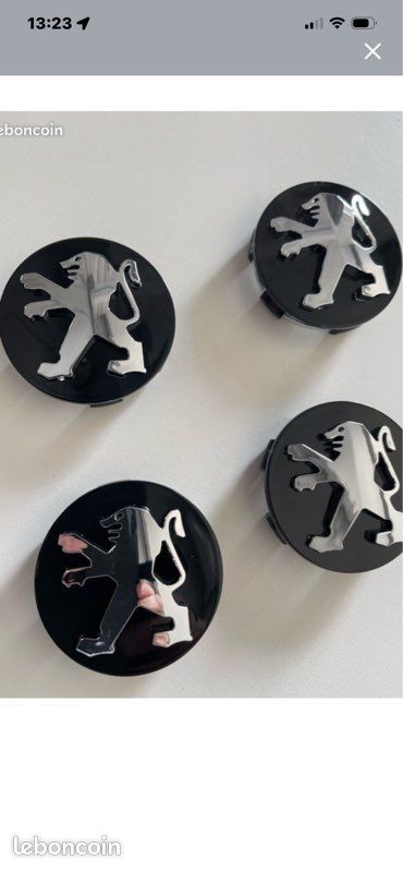 Lot de 4 caches moyeux Peugeot neufs (image 1)
