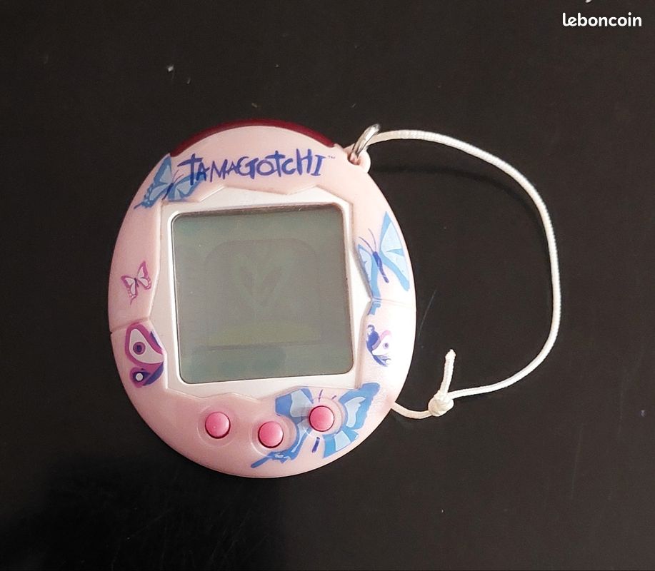 Tamagotchi Connection Bandai – Édition 20 Ans – Infrarouge – 50 Personnages – 6 Mini-jeux