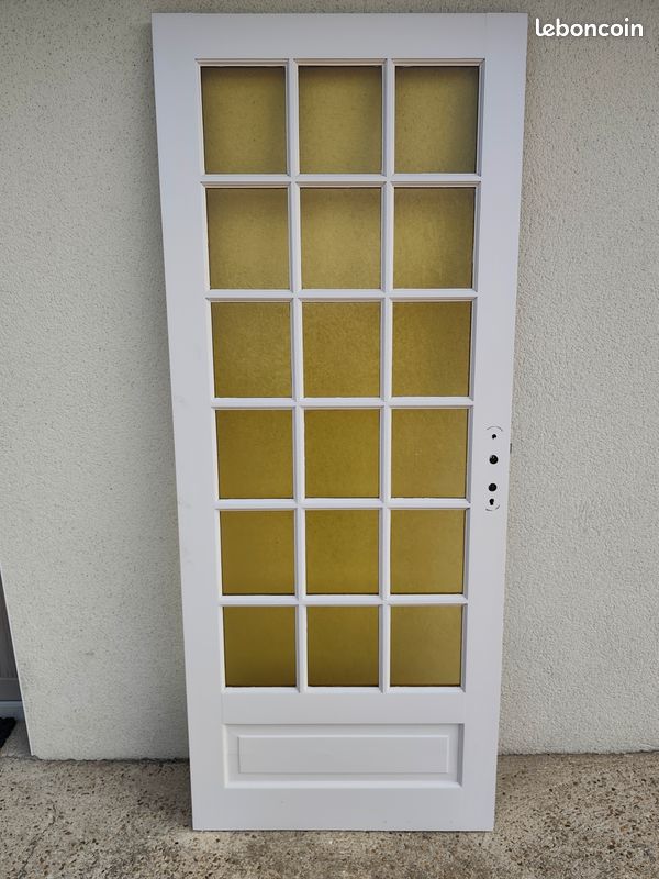 Porte vitrée en bois exotique (image 1)