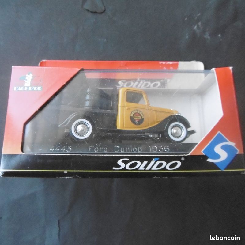 LE357 SOLIDO PRESTIGE 8004 Camion 1/18 Ford pick up V8 baché publicitaire Dunlop EUR 26,24 - FR