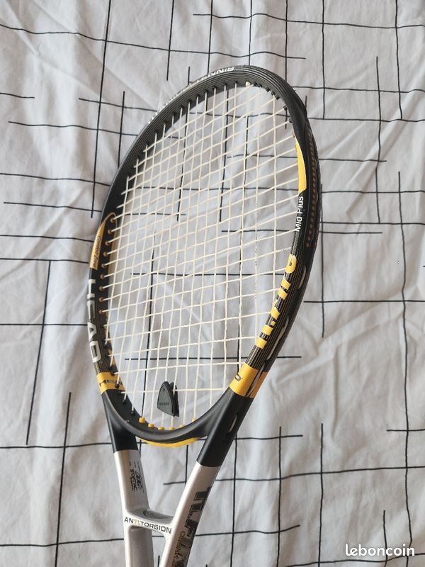 Head Ti.Fire Comfort Zone Mid-Plus 4 1/2 grip tennis racquet