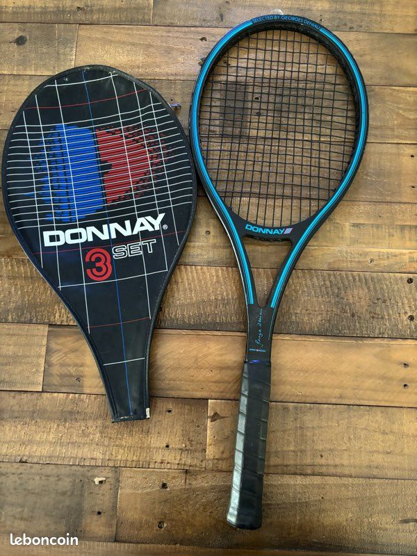 Set badminton Donnay - 2 raquettes (rouge / blanc / noir) + 3 navettes et sac de rangement