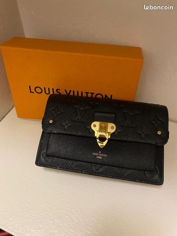 Shop Louis Vuitton Vavin chain wallet (PORTEFEUILLE CHAINE VAVIN