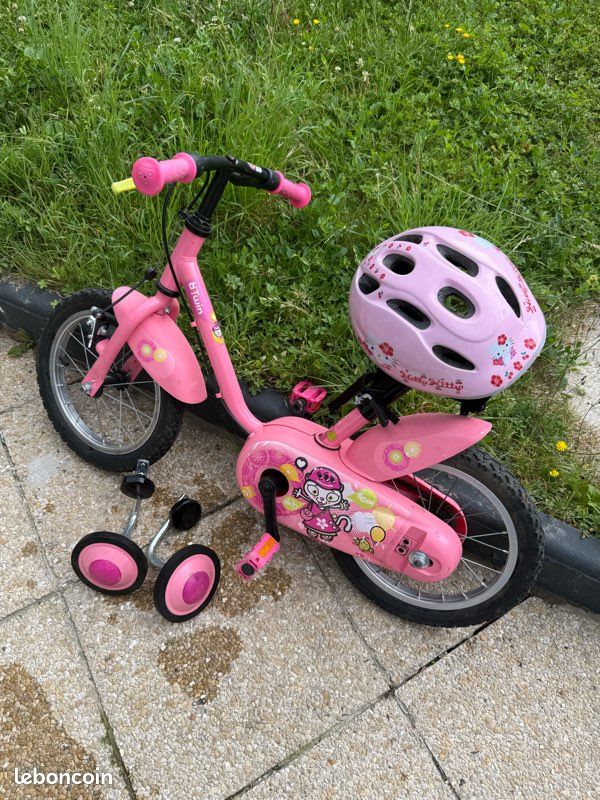 Vélo enfant B-Twin rose Ticha 14" et casque (image 1)