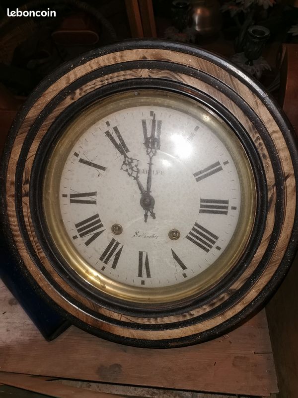 Œil de bœuf pendule ancienne (image 1)