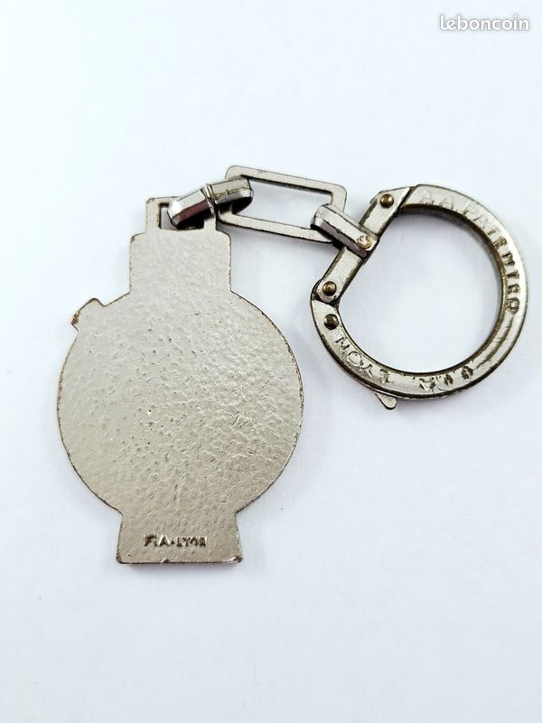 Porte-clés argenté bouteille de parfum chic