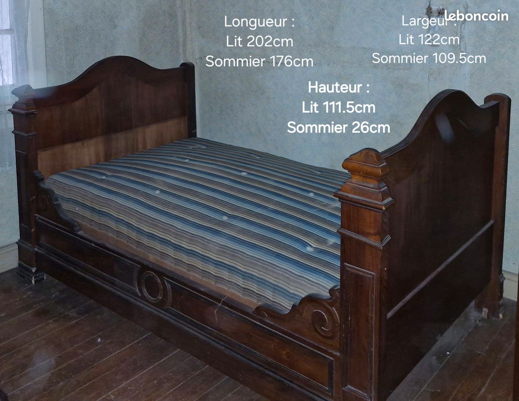 Ancien lit en bois sur roulette (image 1)