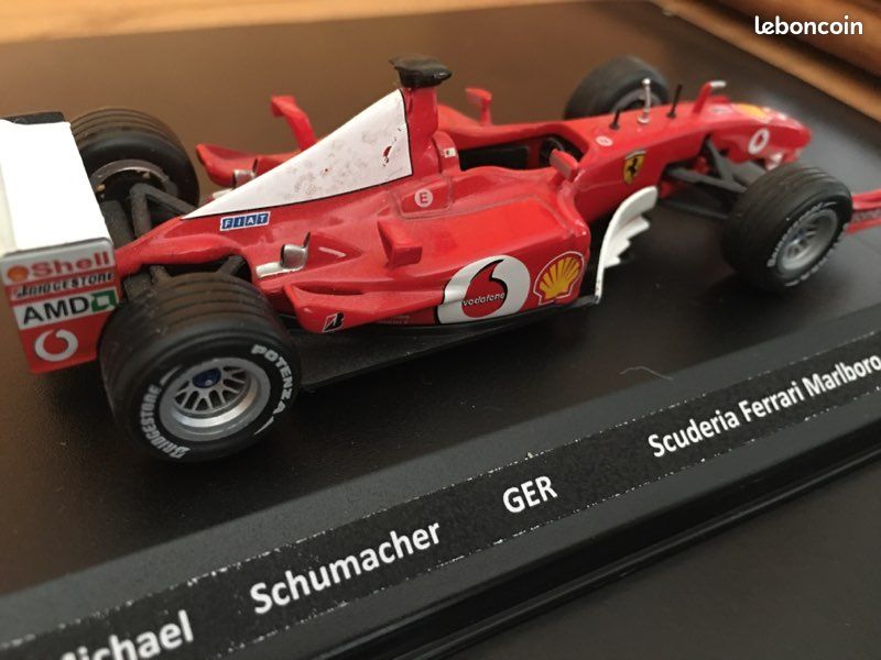 ALTAYA.GRANDES FERRARI. F1 1/24 N°10 FERRARI. F 2003 MICHEL SCHUMACHER