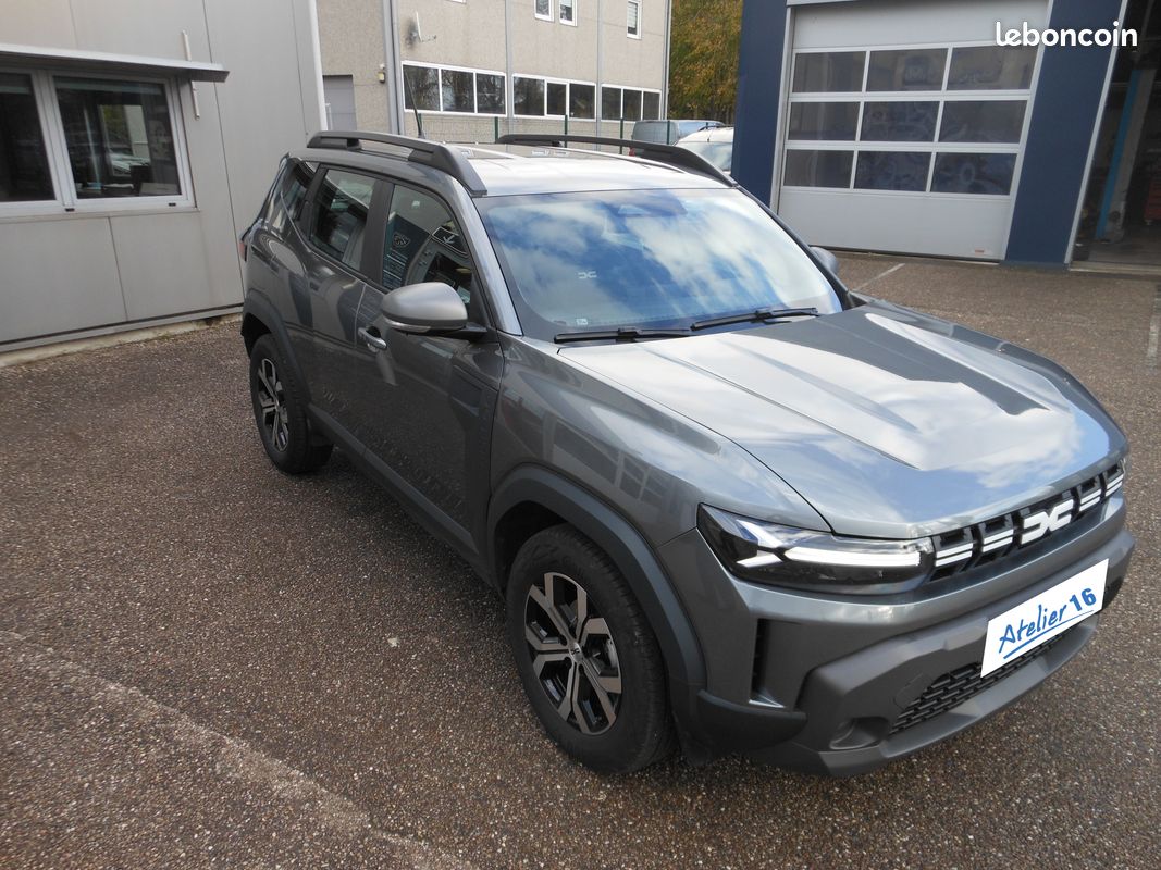 Dacia Duster 130 Ch TCE Mild Hybrid Expression BVM gris + sieges chauffant / NAV et garantie (image 6)
