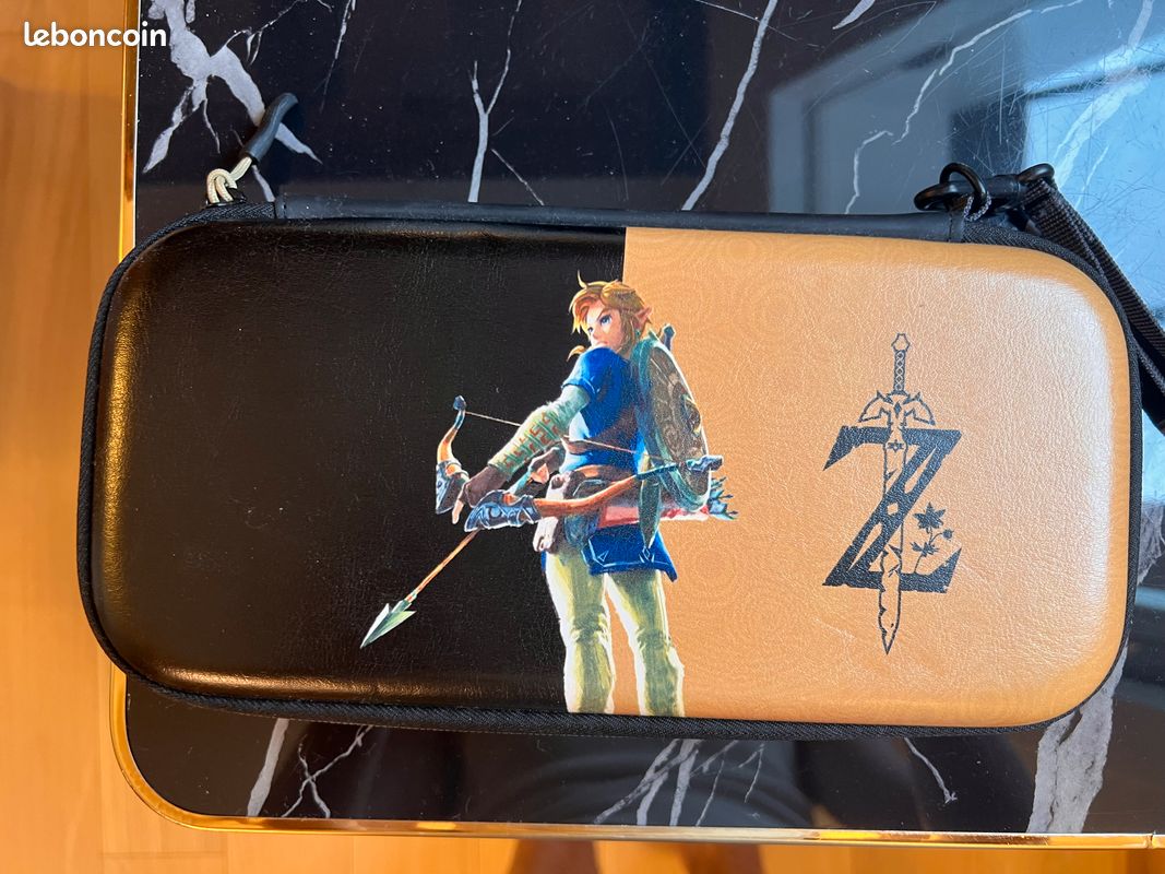 Nintendo Switch OLED blanche + manette Pro + 3 jeux (Zelda TOTK, Animal Crossing, Pokémon) (image 2)