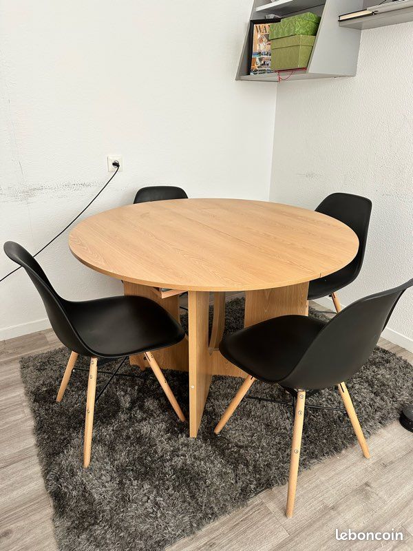 Table a manger ronde en bois extensible (image 1)