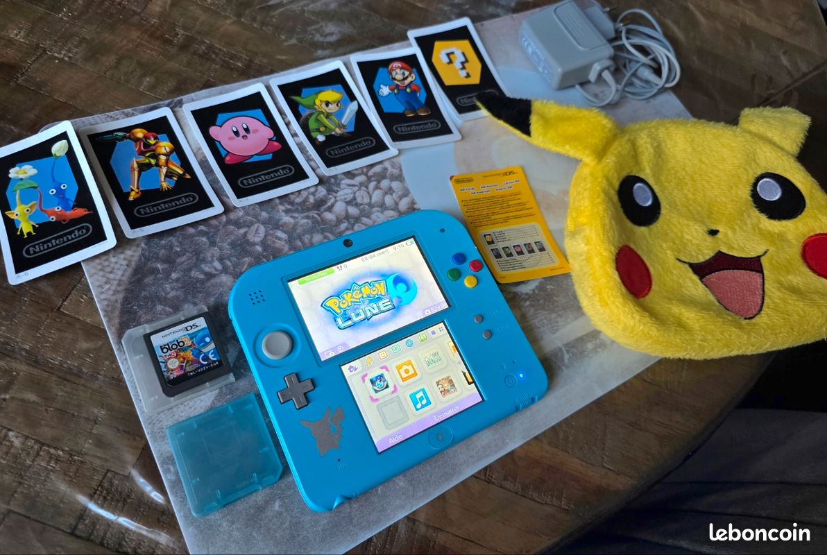 Pack Collector Nintendo 2DS Pokémon Lune + Sacoche Pikachu (image 1)