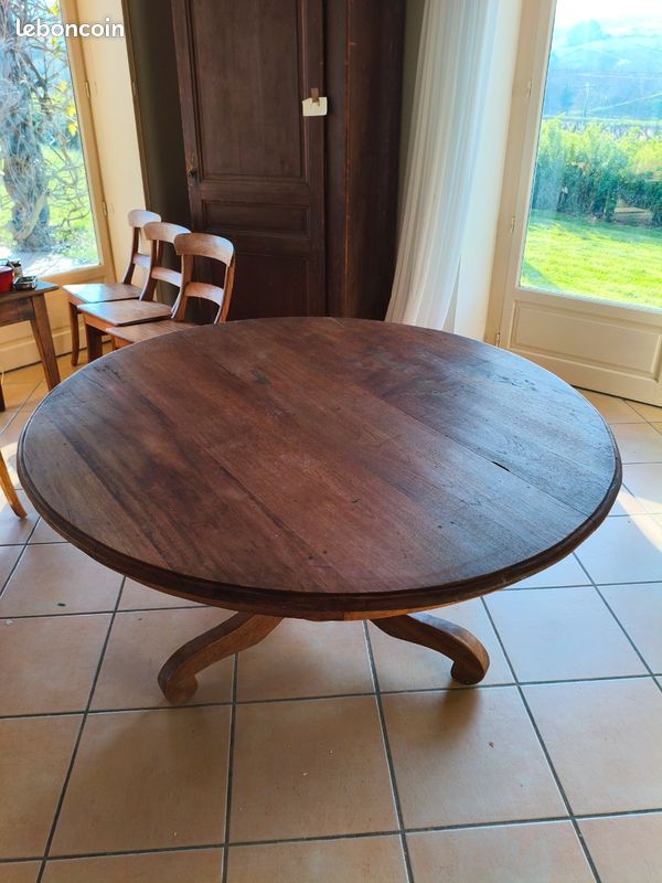 Table à manger design noire avec plateau coulissant en verre trempé