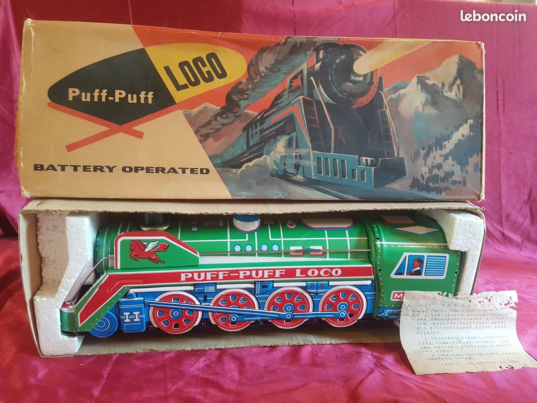 Jouet " PuffPuff Loco ", un train à pile en tôle fabriqué en Chine (image 1)