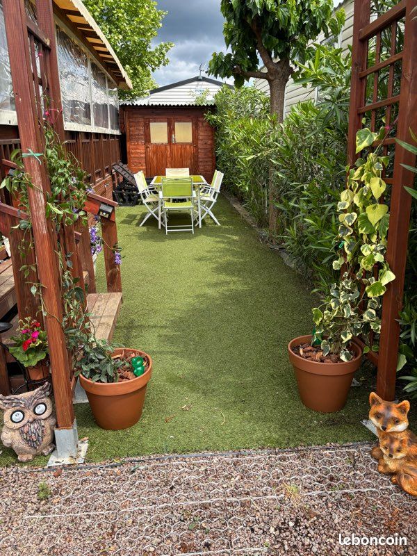 Table de jardin en verre (image 4)