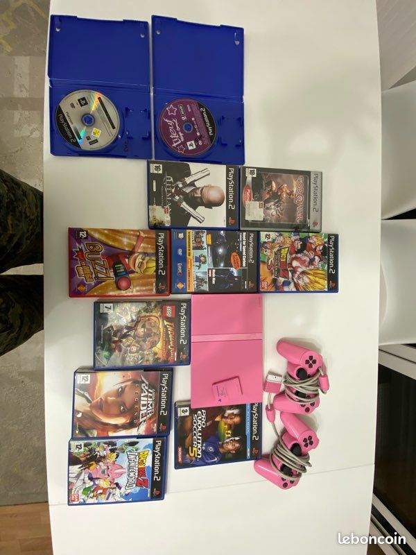 PlayStation 2 Slim Rose + 2 manettes officielles + jeux (image 1)