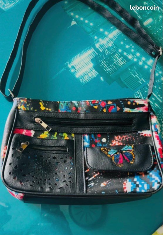 Sac bandoulière multipoches (image 1)