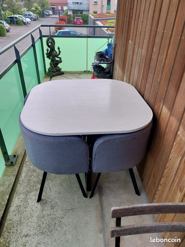 Table + 4 chaises encastrables (image 1)