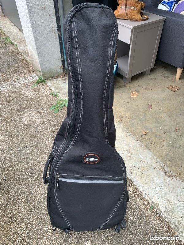 Vend Guitare enfant + support + house de transport (image 3)