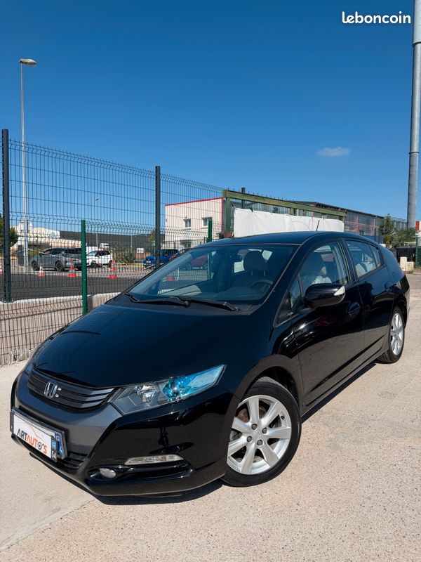 HONDA INSIGHT 1.3 I-Vtec HYBRIDE 102 CH / Edition Elegance / CLIM AUTO / Feux Xenon / Boute auto / JANTES Alu / Sièges Chauffants / PREMIERE MAIN CARNET COMPLET HONDA (image 9)