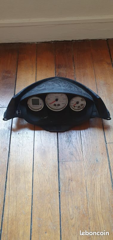 Compteur + entourage scooter Peugeot Elystar 125cc (image 1)