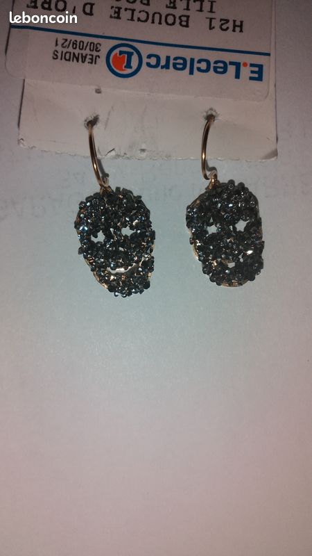 Boucle d'oreille acier neuf (image 1)