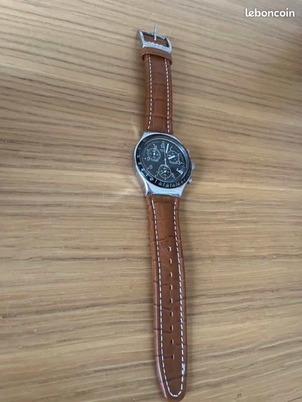 Swatch Irony Chrono modèle YCS429 « Dark Phœnix » Montres Bijoux