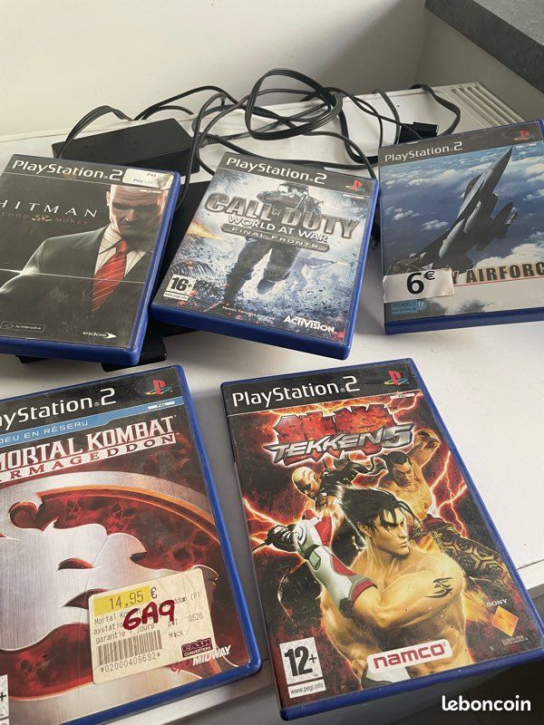 PlayStation 2 slim + manettes + jeux (image 5)