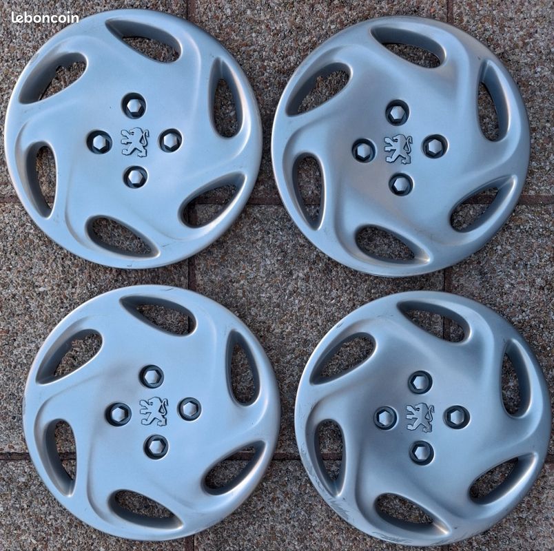 4 enjoliveurs Peugeot 206 taille 14 pouces modèle Florida en très bon état (image 1)