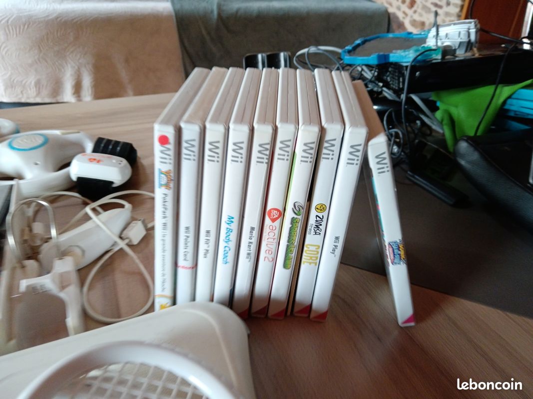 Vends Wii fit avec jeux et accessoires (image 3)