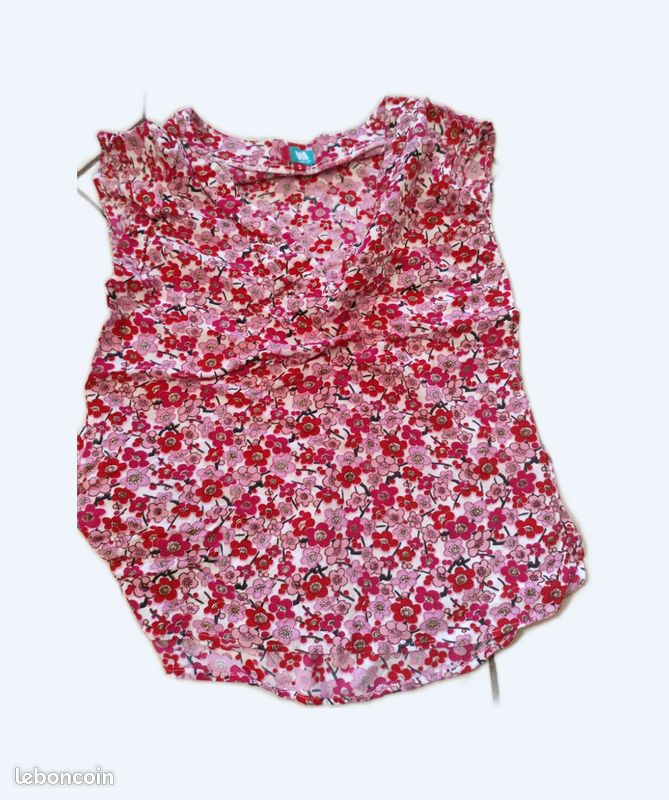 Joli haut fleuri taille S sans manche col V (image 1)