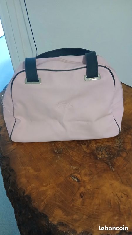 Vend sac à main pour femme lacoste je ne fais pas d'envoi (image 2)