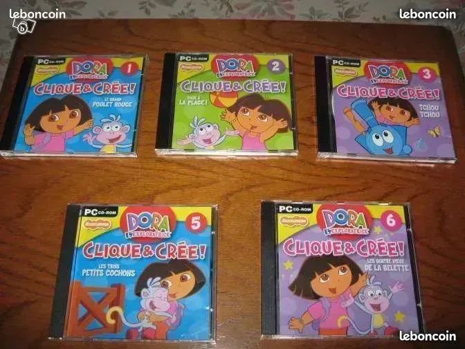 5 jeux pour PC DORA bon état " clique et crée  " pour apprendre l anglais dessiner jouer compter ect... (image 1)