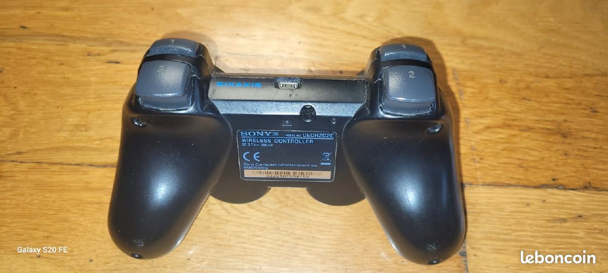 Ps3 slim + 1 manette + 1 manette offerte+lot de 7 jeux (image 5)