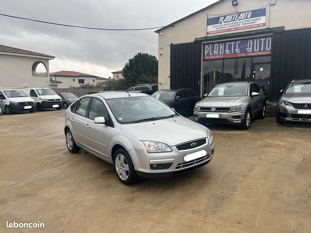 Ford FOCUS 1.6 100CH GHIA BVA 4P (VOLANT À DROITE) (image 1)