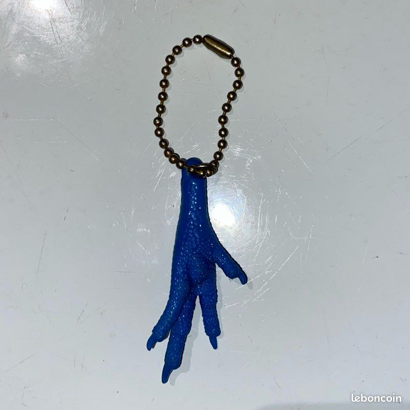 Porte clé patte de poulet/coq sportif ? (image 2)