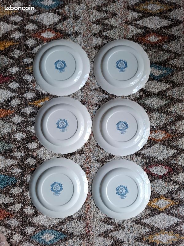 Quatre assiettes à dessert D. Porthault par L'Ancienne Manufacture Royale