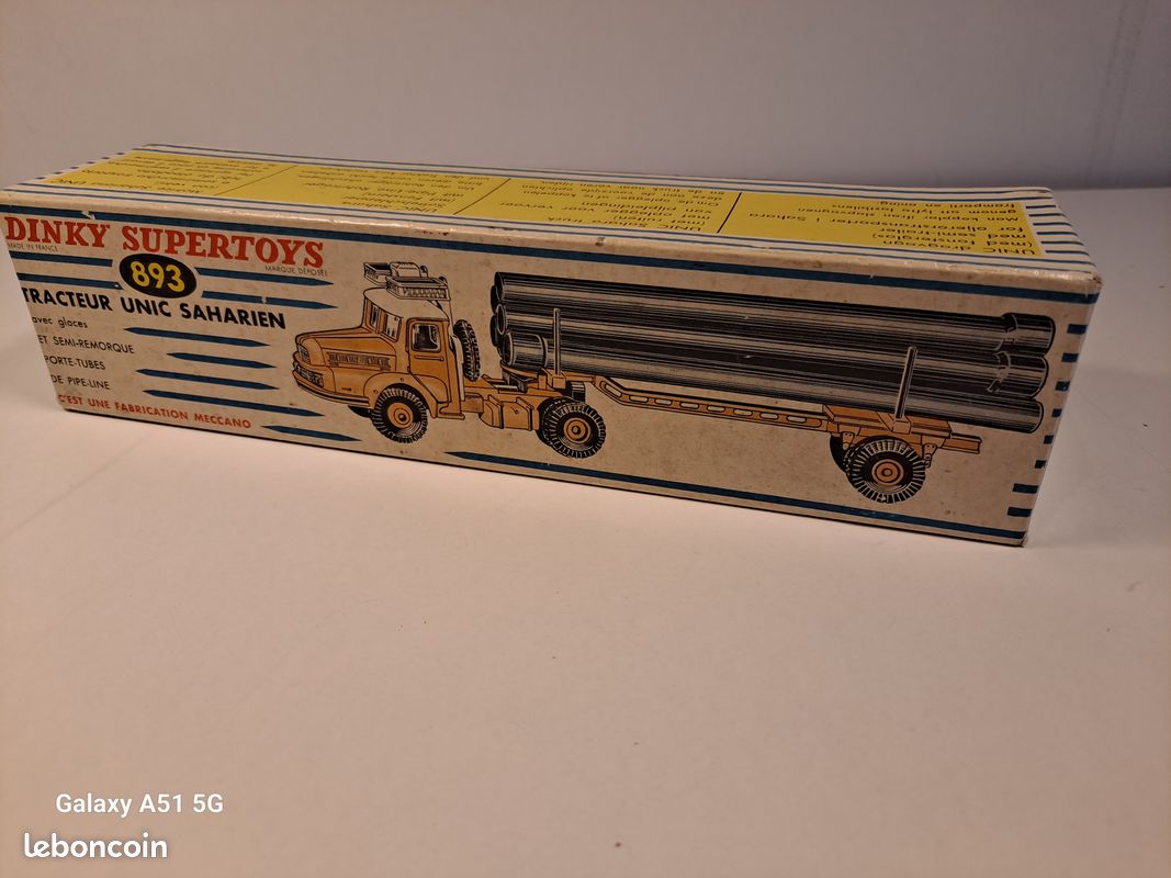 A French Dinky Supertoys No. 893 Unic Sahara Tractor with pipe carrier