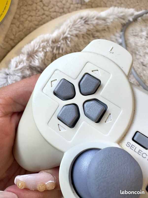 Lot Sony PlayStation 1 SCPH-5502 PAL - 4 Manettes, 10 Jeux, Câbles - Occasion