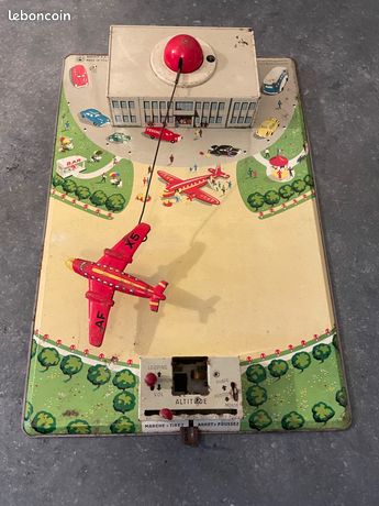 Ancien jouet toys Joustra en tôle aéroport avec avion loopin