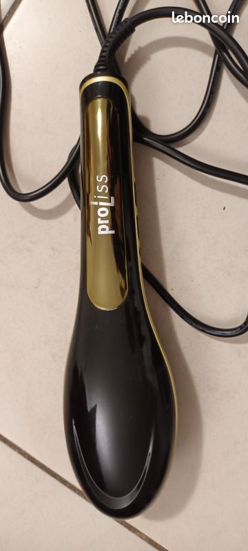 Brosse à cheveux chauffante (image 1)
