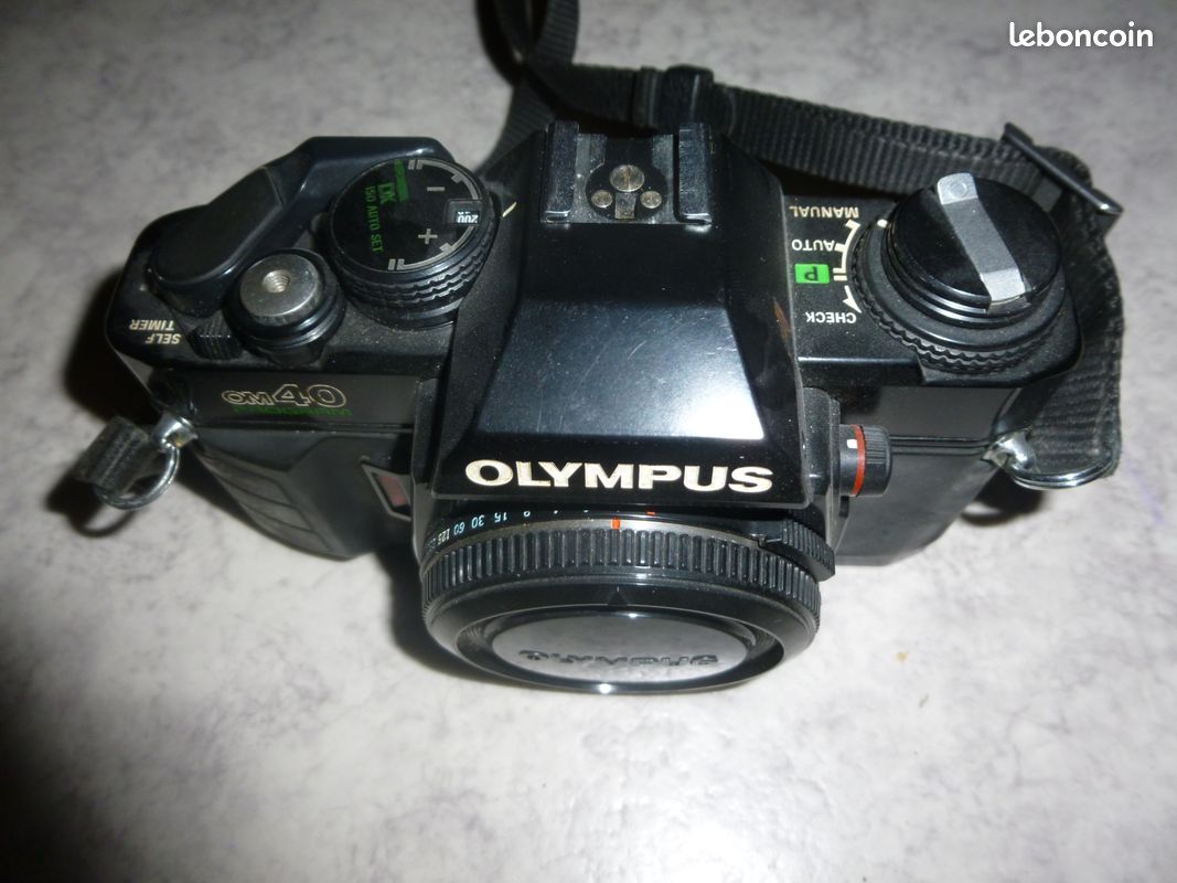 Olympus OM40 Program Instructions (A) – Kamerastore