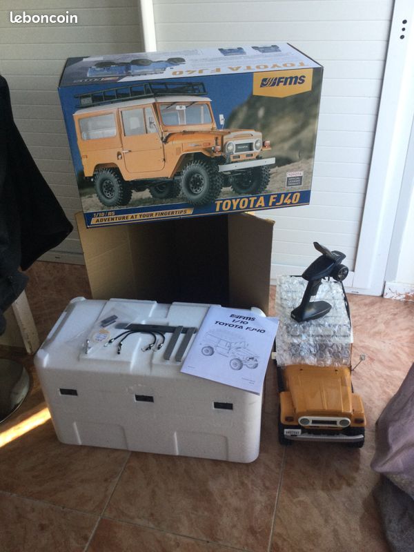 Superbe rc crawler typé scale Toyota fj40 FMS + options équipé esc firma smart 70A moteur brushed 35T , 2S / 3S + 1 beau lot offert (image 1)